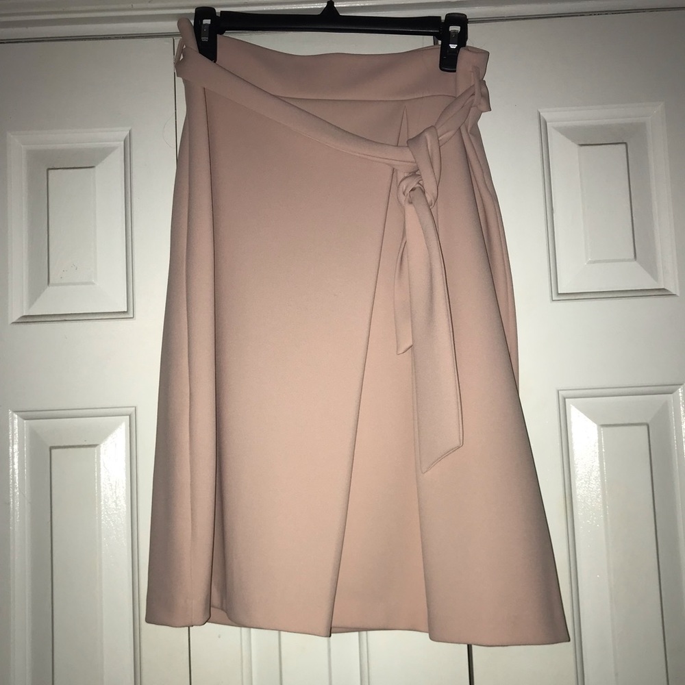 Light pink knee length skirt